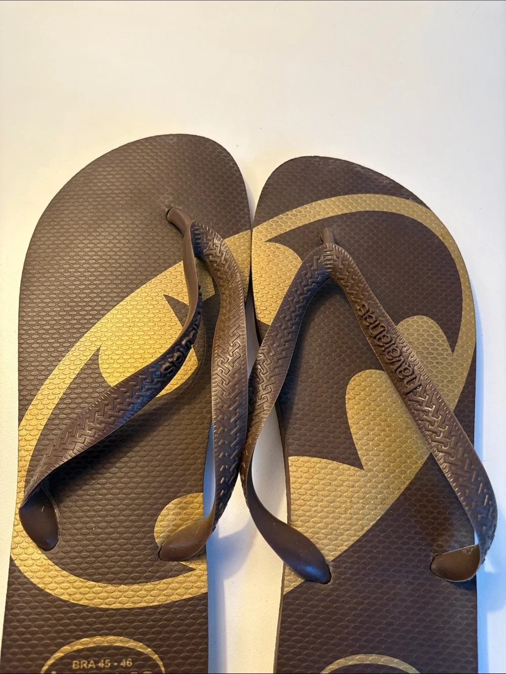 THREE pairs of men’s flip flops